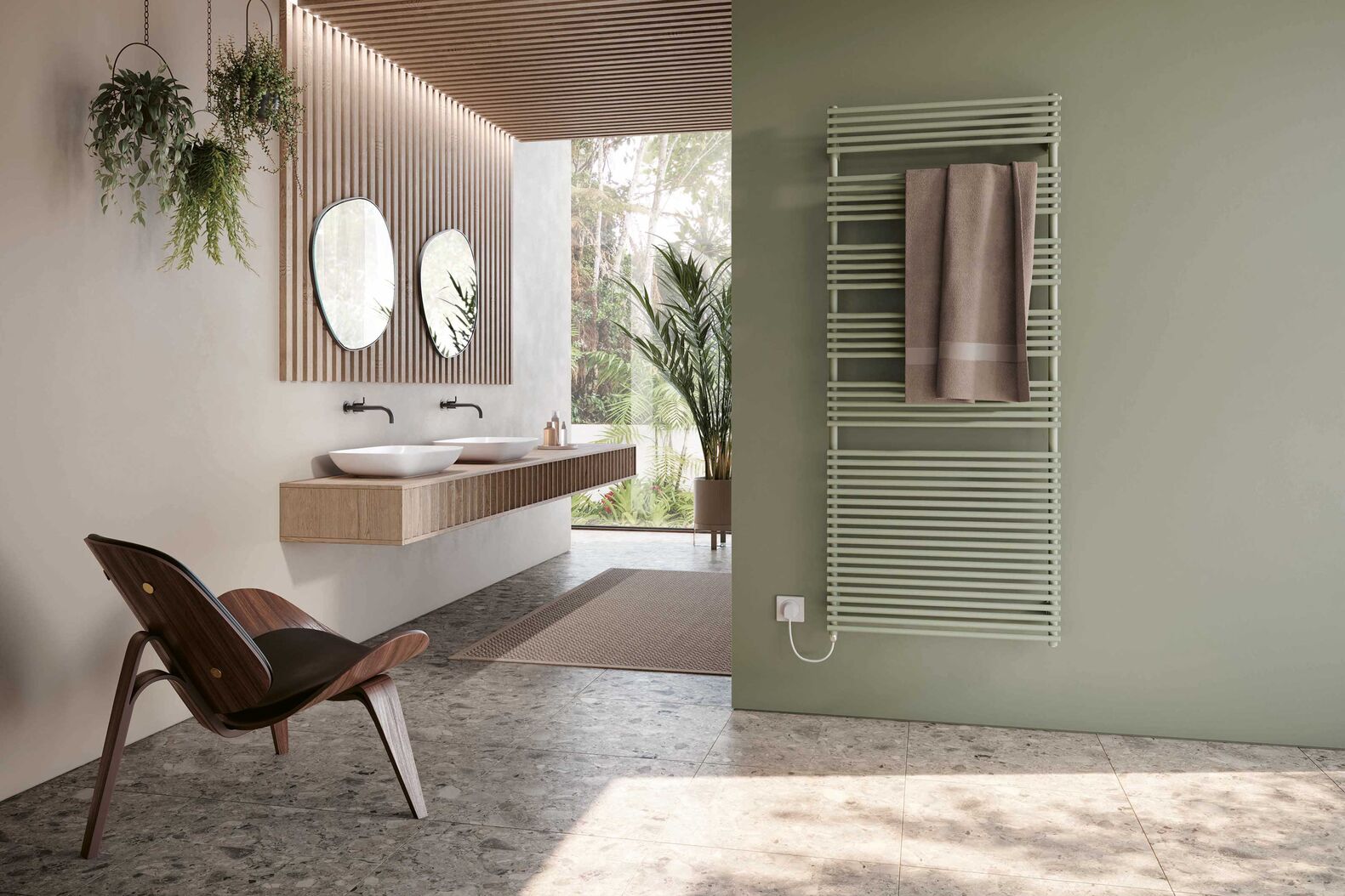 Auch der Heizkörper spielt im Badezimmer eine wichtige Rolle: Beim Modell «Mirada» sorgen filigrane Querrohre für Leichtigkeit. Systec Therm AG, www.systectherm.ch
